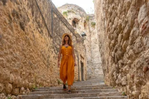 girona-medieval-city-a-young-tourist-walking-thro-2024-12-09-04-59-16-utc