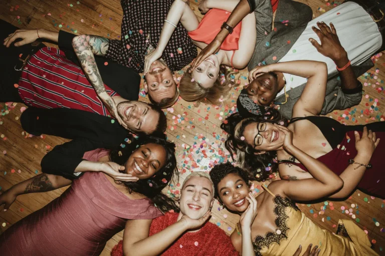group-of-friends-lying-on-the-floor-at-a-party-2025-02-10-08-21-43-utc