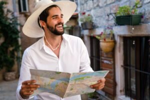 Happy tourist man having fun and travelling on summer vacation