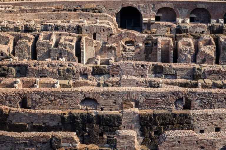 Long shot of interior of the Colosseum with arena details in Rome, Italy