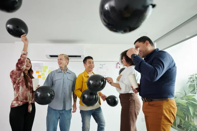 managers-and-developers-throwing-balloons-2025-02-11-13-56-50-utc