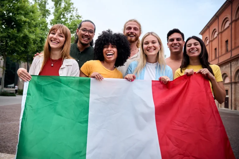 multiracial-group-of-friends-holding-the-italian-f-2025-04-15-18-20-21-utc