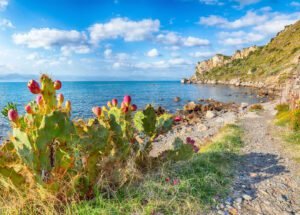 Scenic spring view on the the cape Milazzo panorama of nature reserve Piscina di Venere.  Location: cape Milazzo, Tyrrhenian sea, Island Sicilia, Italy, Europe
