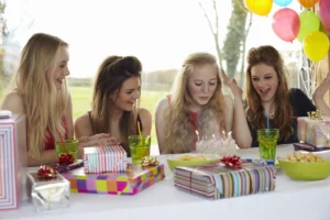 teenage-girl-blowing-out-birthday-candles-with-fri-2025-04-03-04-59-43-utc
