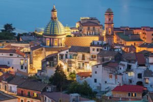 Vietri Sul Mare, Italy town skyline on the Amalfi coast at dusk.